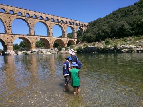 Beach area in the shadow of Pont du Gard, near Nimes, France