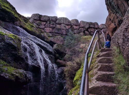 Making our way out of the talus caves beside a waterfall, Pinnacles NP, CA