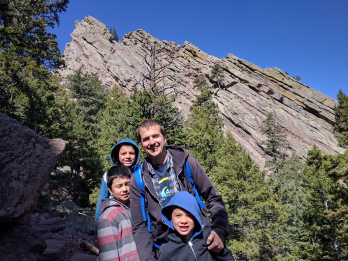 In front of the angled rocks at Flatirons, Boulder, CO