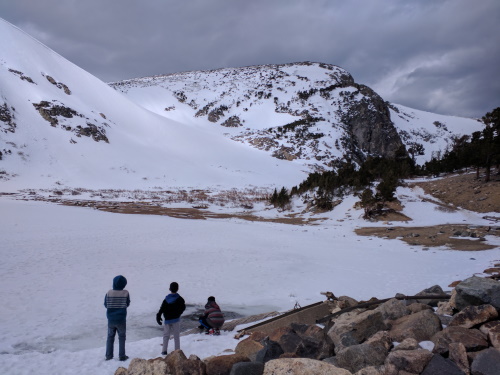 At frozen St. Mary's Lake, at the base of St. Mary's Glacier, near Idaho Springs, Colorado