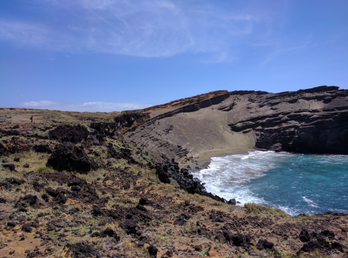 Climbing down to Green Sand Beach, if you look closely you will find a dot sized figure on the top of the slant. That's my husband!