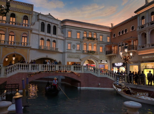 Watching gondolas float by near St. Mark's Square in the Venetian, Las Vegas, NV