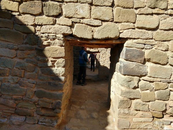 Walking through the small rooms of Aztec Ruins National Monument, Aztec, NM