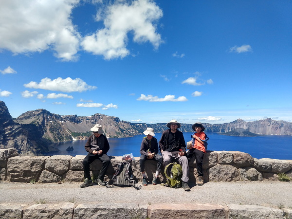 Lunch at a viewpoint with Phantom Ship in the background, Crater Lake, OR