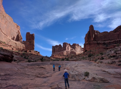 Walking between the giant 'buildings' of Park Avenue, Arches NP, UT